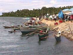 Fishermen parked their boats at the sunday market